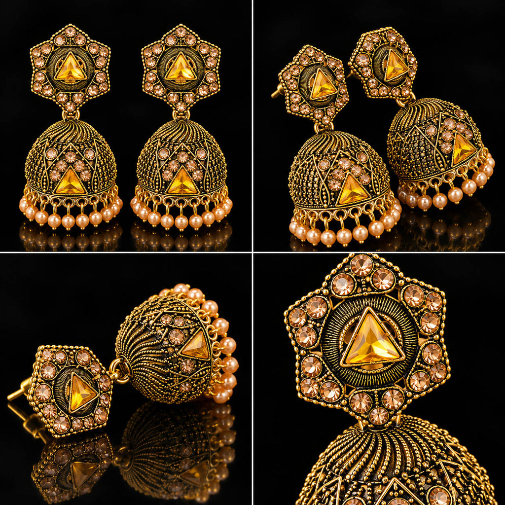 Elevate your ethnic look with these designer antique gold-finish jhumka earrings, featuring intricate detailing, sparkling stones, a statement triangular centerpiece, and delicate pearl-bead drops. Perfect for sarees, lehengas, festive outfits, weddings, and traditional occasions.

Detailed Product Description

Add a touch of royal Indian elegance to your jewellery collection with these beautifully crafted traditional jhumka earrings for women. The earrings feature an ornate antique-gold finish with intrica