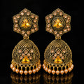 Elevate your ethnic look with these designer antique gold-finish jhumka earrings, featuring intricate detailing, sparkling stones, a statement triangular centerpiece, and delicate pearl-bead drops. Perfect for sarees, lehengas, festive outfits, weddings, and traditional occasions.

Detailed Product Description

Add a touch of royal Indian elegance to your jewellery collection with these beautifully crafted traditional jhumka earrings for women. The earrings feature an ornate antique-gold finish with intrica