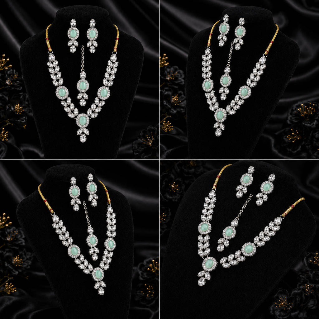 A four-panel collage showing a jewelry set displayed on black velvet busts against a black satin background. The set includes a necklace and matching earrings with light aqua round stones and silver-toned settings.