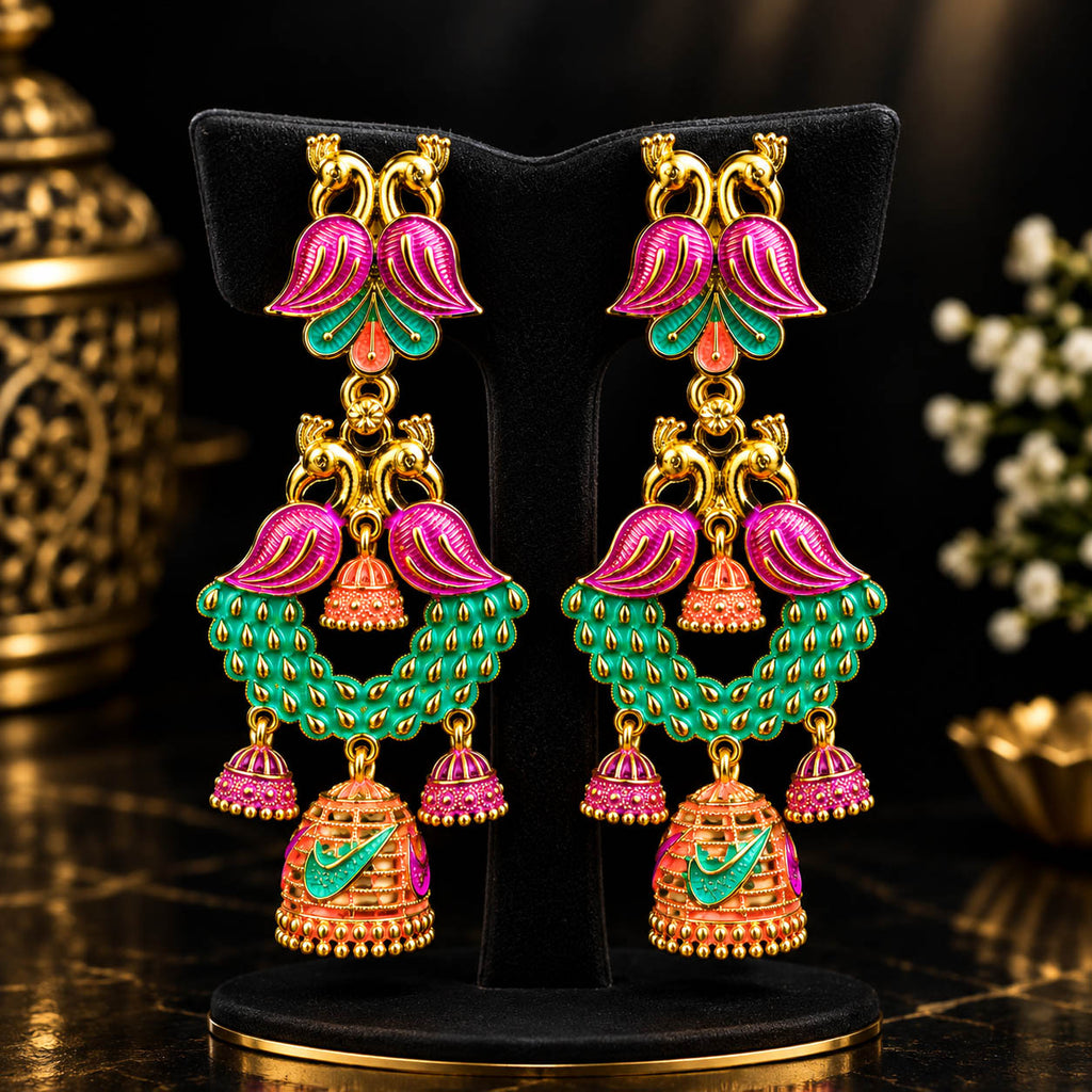 Add a vibrant traditional touch to your jewellery collection with these beautifully detailed multicolor jhumka earrings. Featuring striking pink and turquoise-green accents with intricate gold-tone detailing, the long dangling design creates an elegant statement look.

Perfect for festive occasions, weddings, ethnic outfits, parties and traditional celebrations, these earrings can complement sarees, lehengas, suits and other Indian ethnic wear.